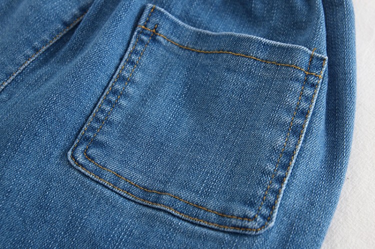 金童城堡&荷叶边腰头四粒扣大贴袋长裤牛仔裤